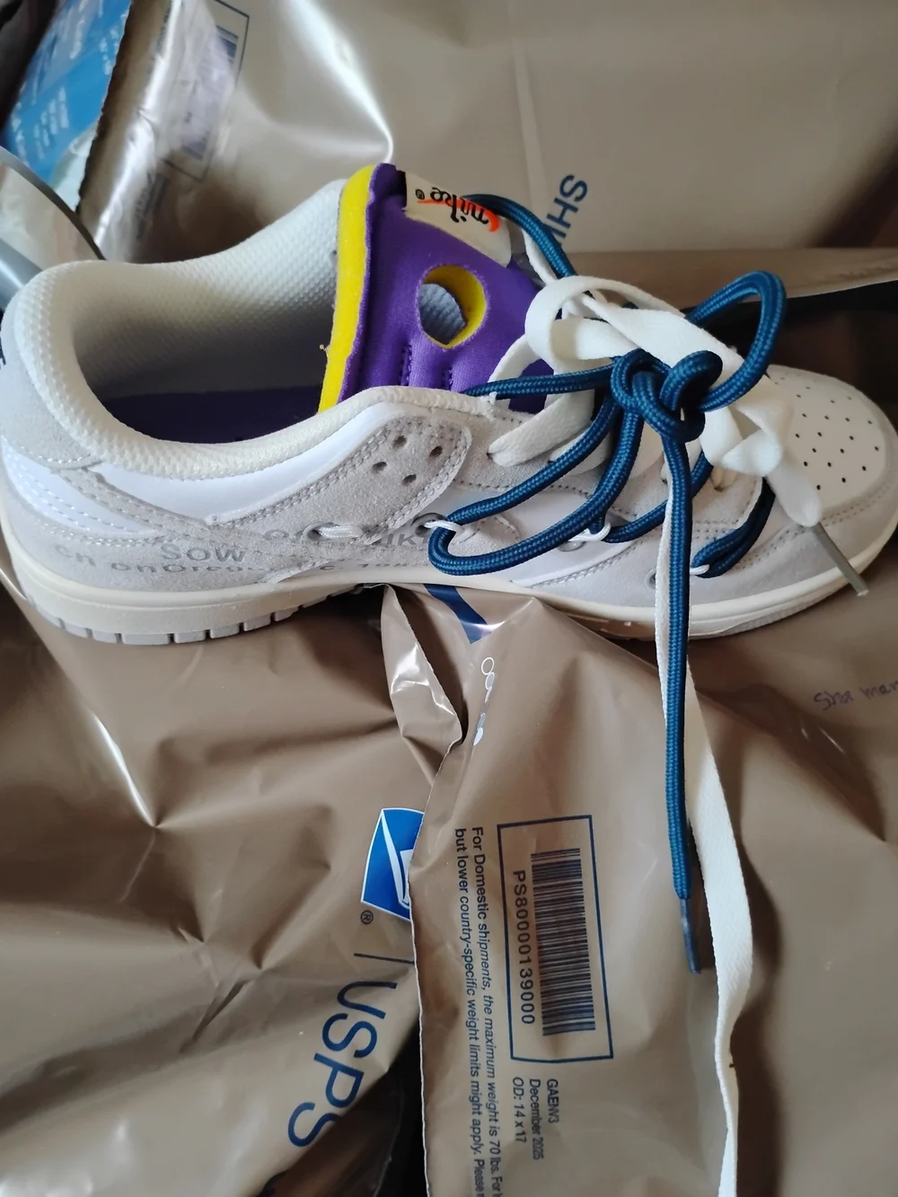 Nike Men’s White Sneakers with Purple and Yellow Accents